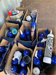 Photograph showing boxes of nitrous oxide cannisters