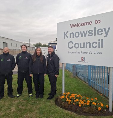 Photograph of the Knowsley Recycling Engagement Team stood in front of entrance to council building