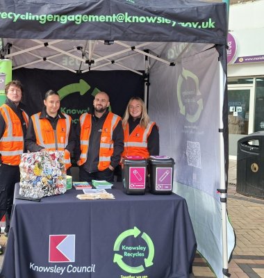Photograph of the Recycling Engagement Team promoting in the community