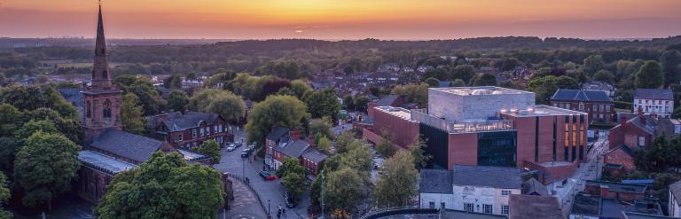 A landscape photograph of Shakespeare North Playhouse from above.