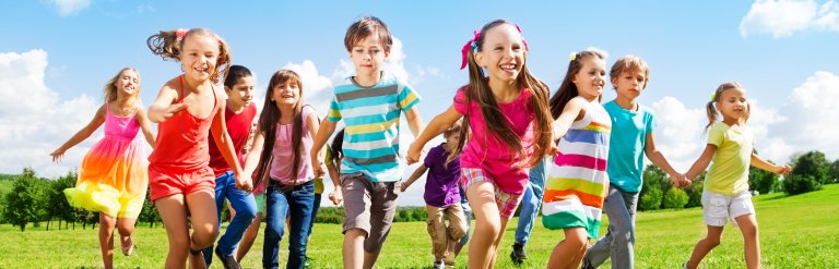 Kids running enjoying summer
